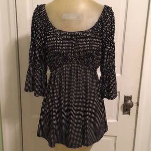 Max studio black top with white polka dots.